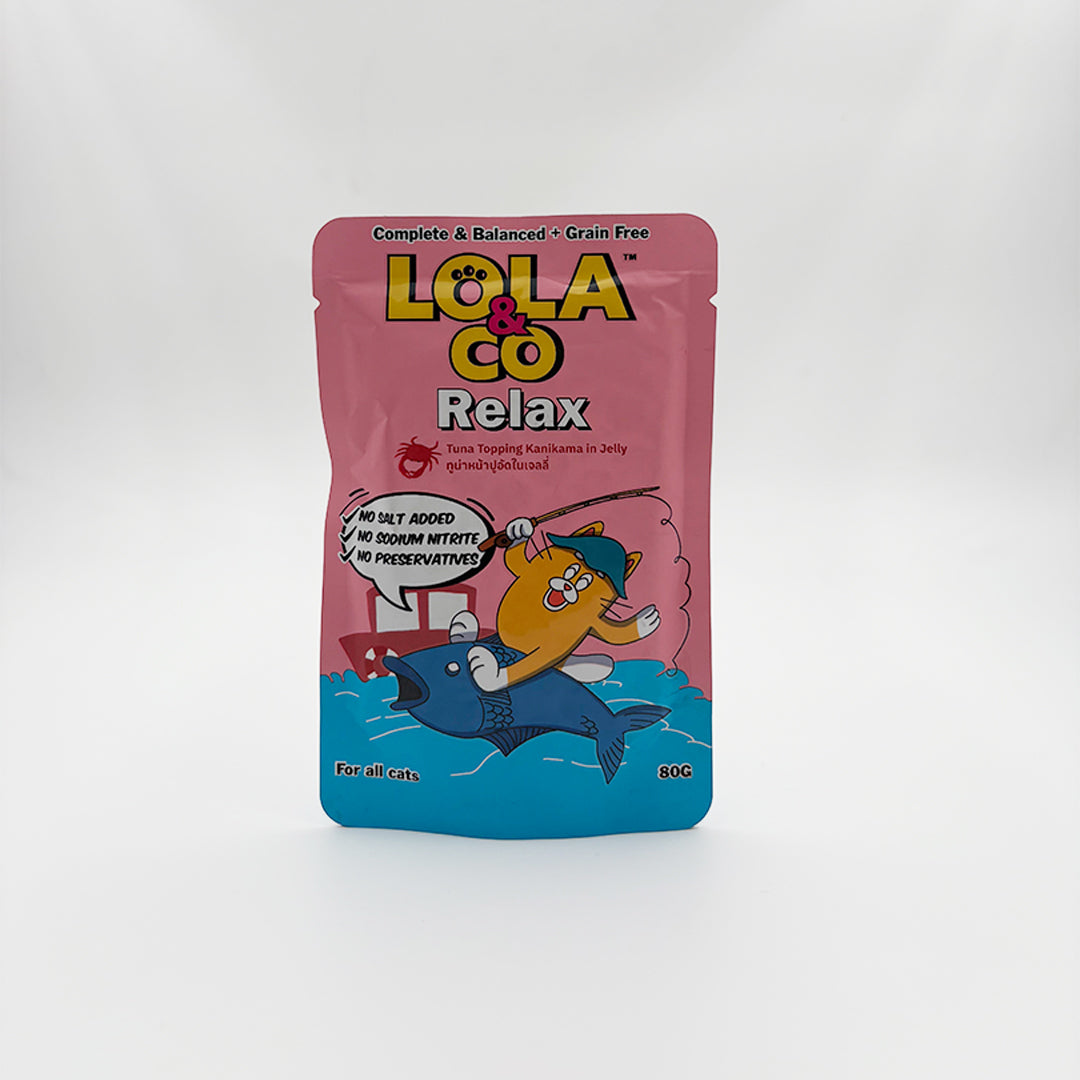 Pink packaging of LOLA & CO Relax cat treat on a white background