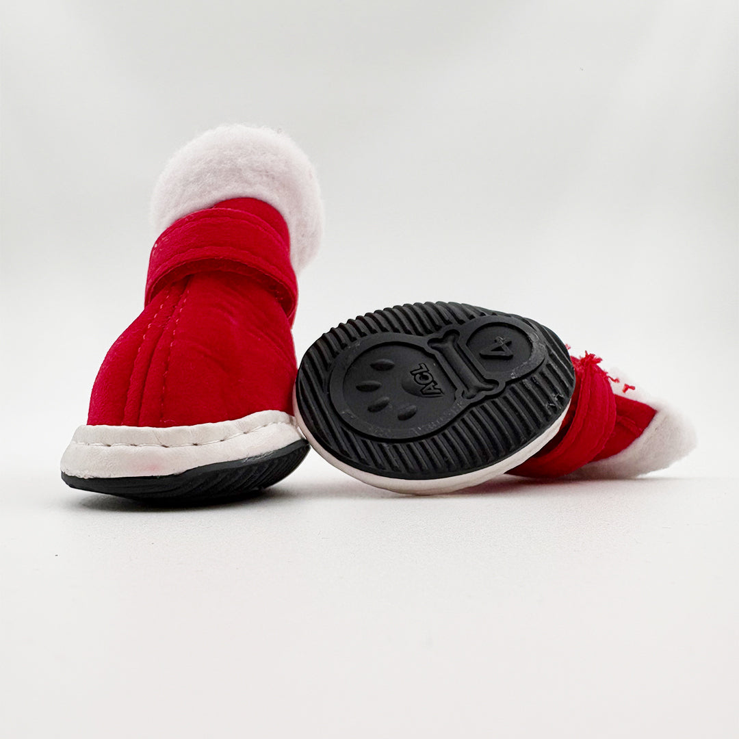 Non-slip rubber sole detail of red Christmas dog shoes