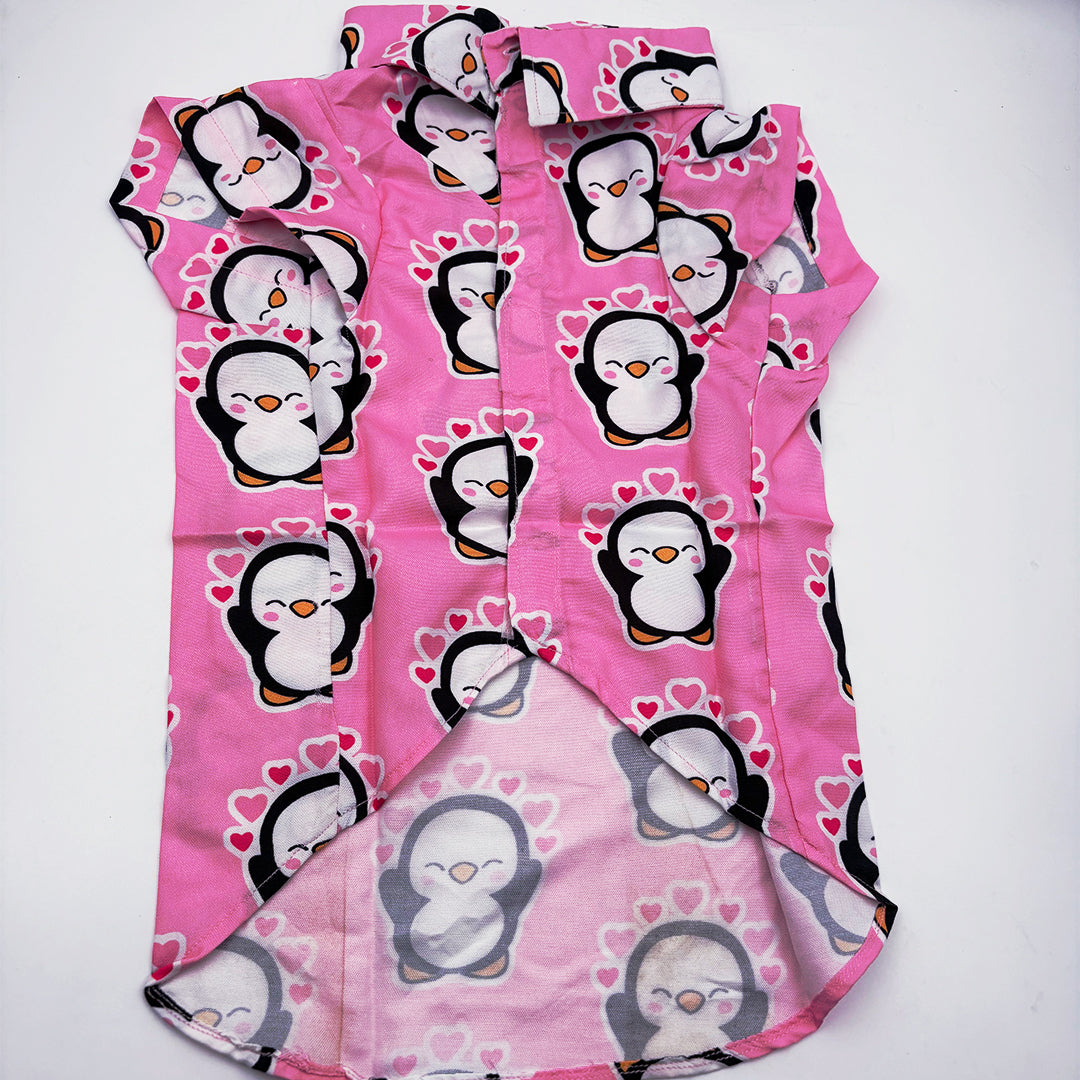 cute puppy wearing penguin dog shirt